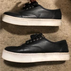 Black leather platform sneakers